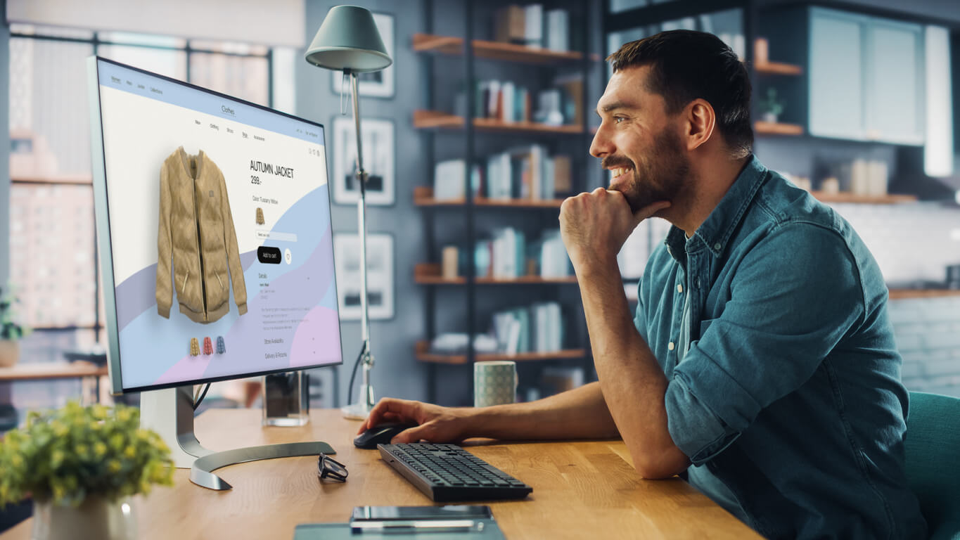 man looking at his purchase on online store